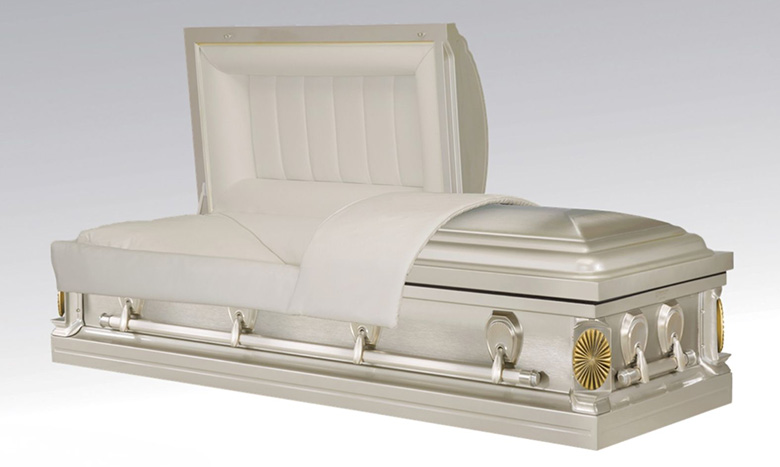 A white and silver casket, a dignified piece of burial merchandise, with the lid partially open to reveal a padded white interior and draped cover, set against a plain light background.