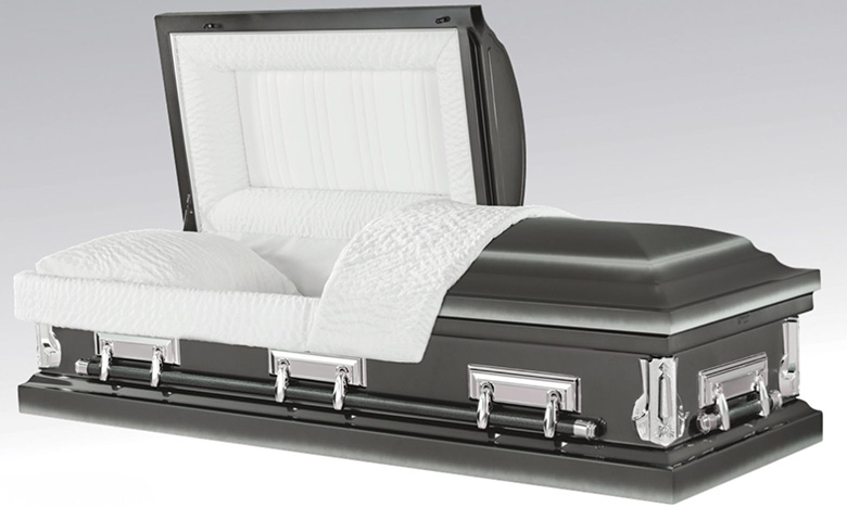 A black casket with silver handles, a distinguished piece of burial merchandise, is displayed with the lid partly open, revealing a white padded interior, pillow, and quilted lining.